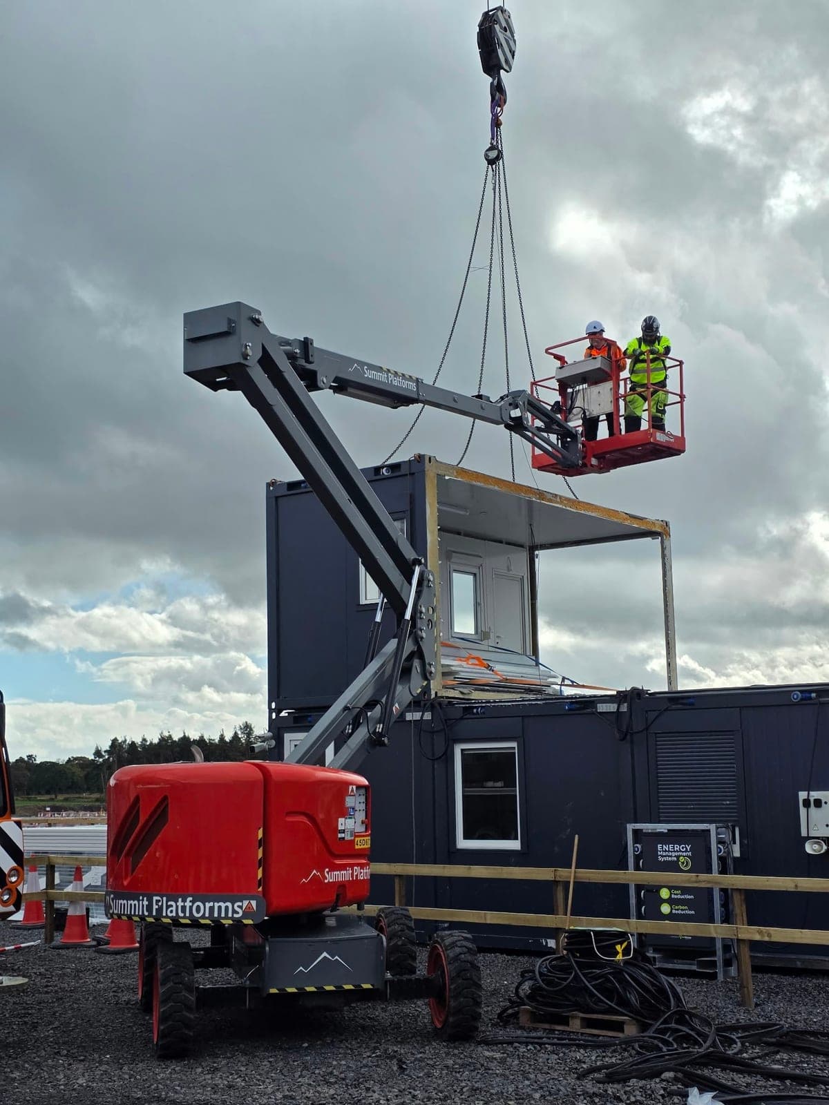 IPAF 3B boom lift operators working on a modular building project in Falkirk, Scotland
