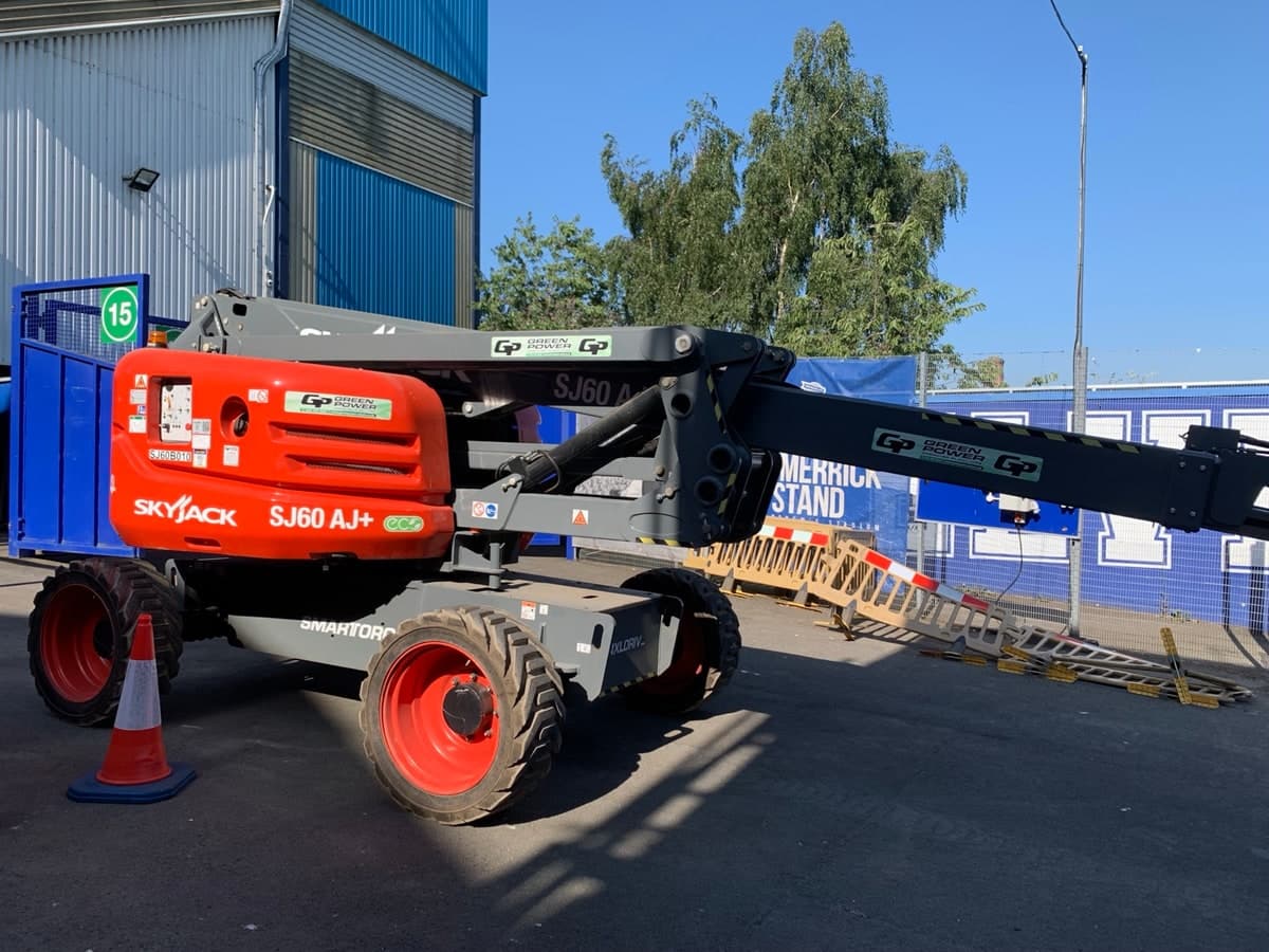 Skyjack articulated boom lift at a football stadium in Birmingham