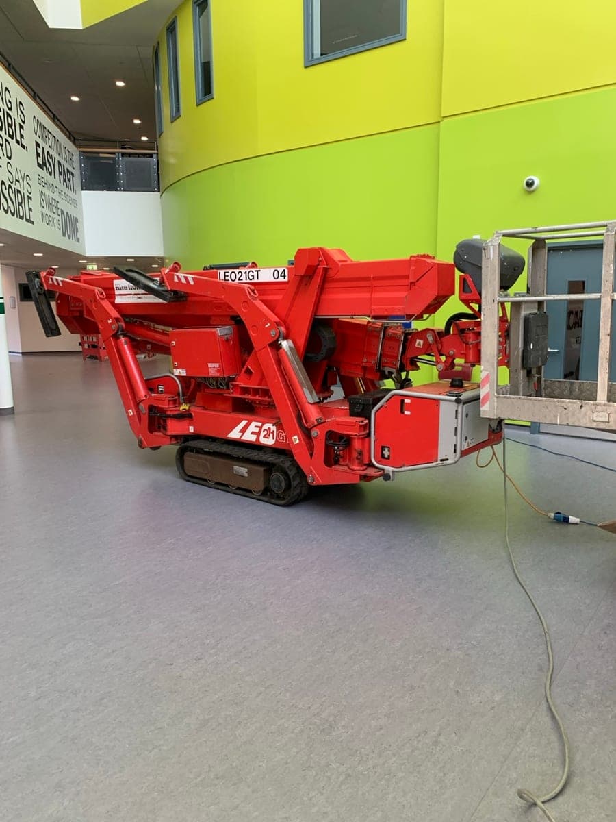 Electric TEUPEN spider lift positioned inside a building in Keighley